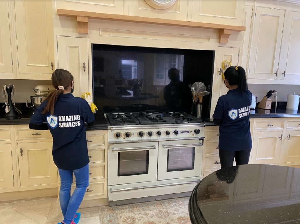 Two cleaners from the London End Of Tenancy Cleaning Team